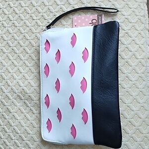 Melie Bianco black and white pink lip wristlet purse